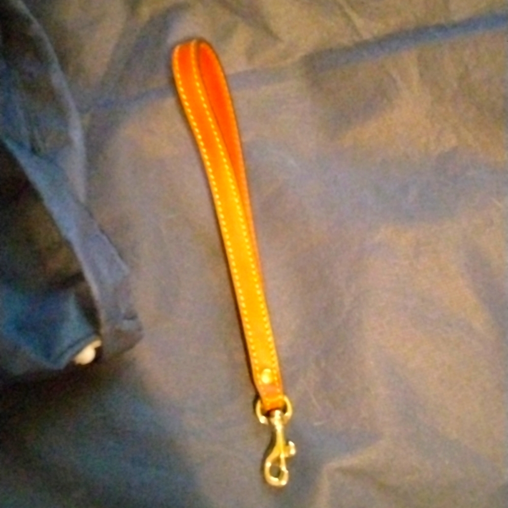Dooney Bourke Wrist Handle. Leather
